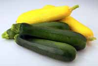 Summer squash are soft skinned and available primiarily during the warm spring and summer months. They are fine to use as occasional substitutes for winter squashes.  Skip the long, green zucchinis, however: they are more closely related, nutritionally speaking, to their cousin, the cucumber. Click on the photo to go to a webpage that discusses the various types of summer squash.  (Photo copyright 1998 Wegmans Produce)